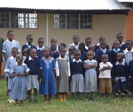 children outside FKC's new school